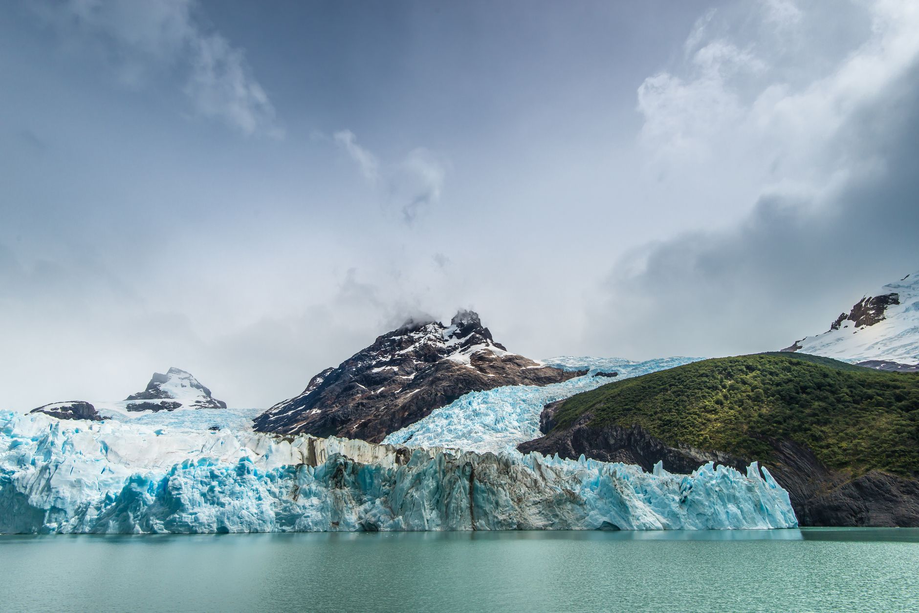 Patagonian mountain ridge and turquoise lake